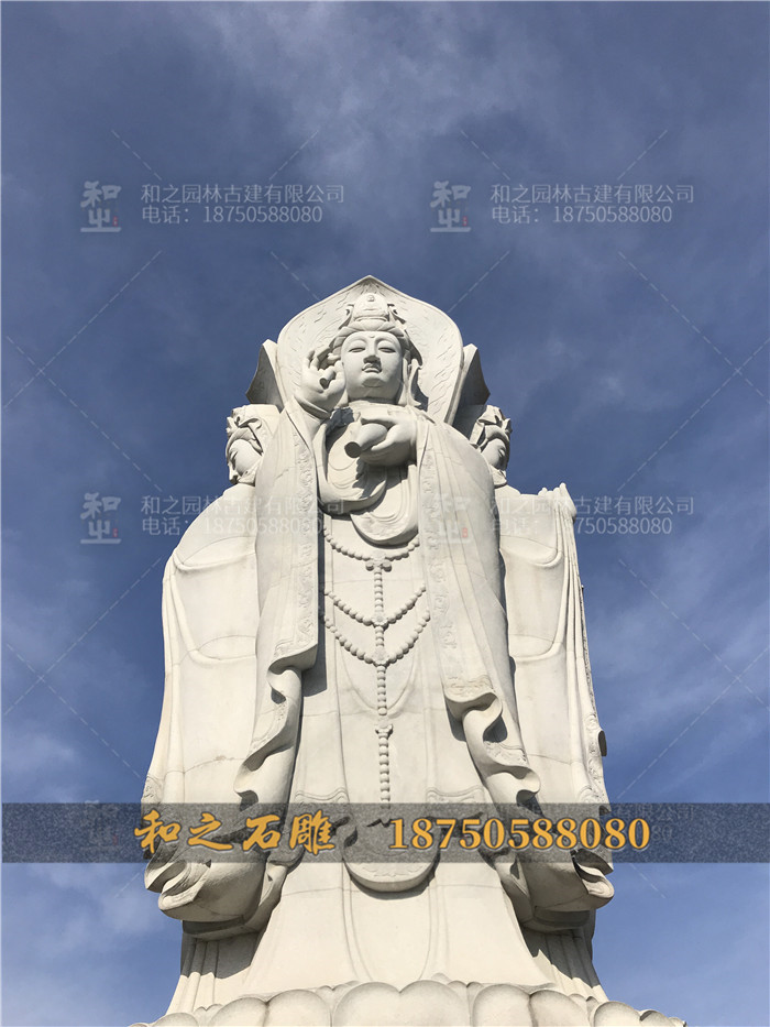 四面觀音石雕像